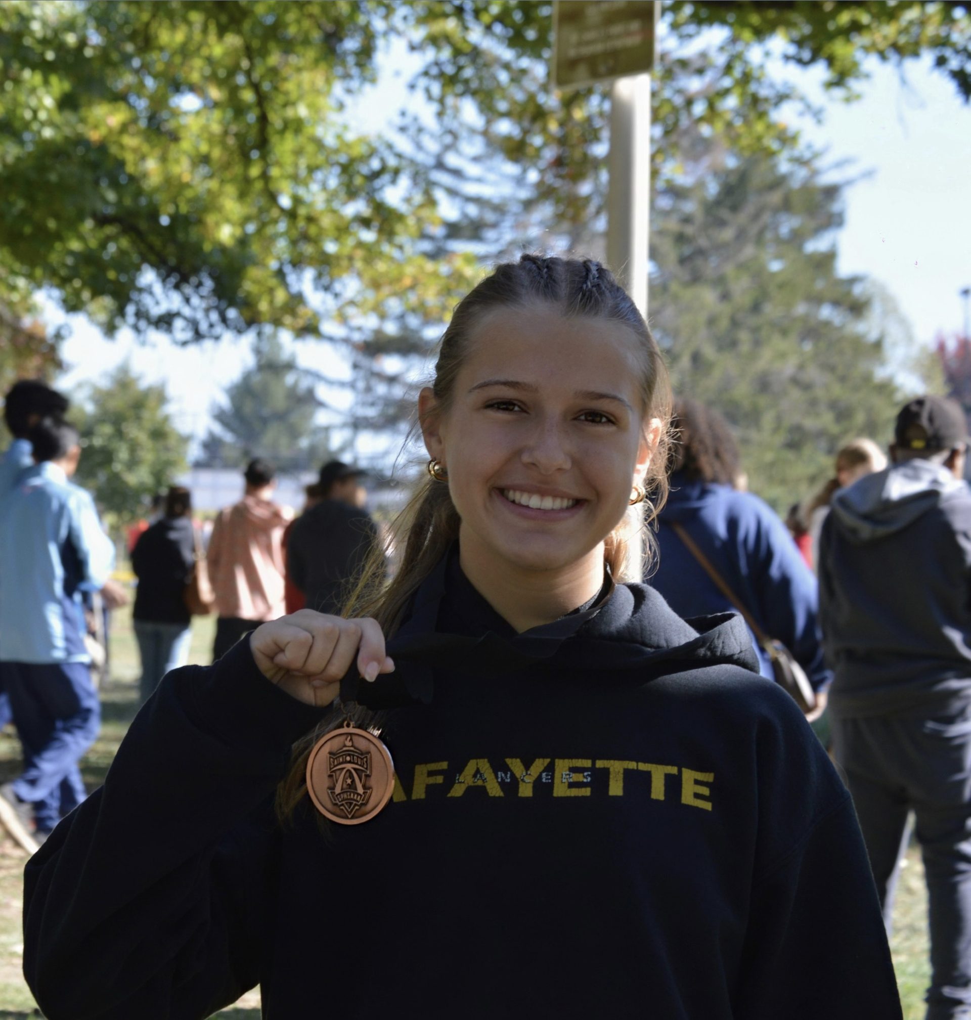 Kelly receiving XC Conference award