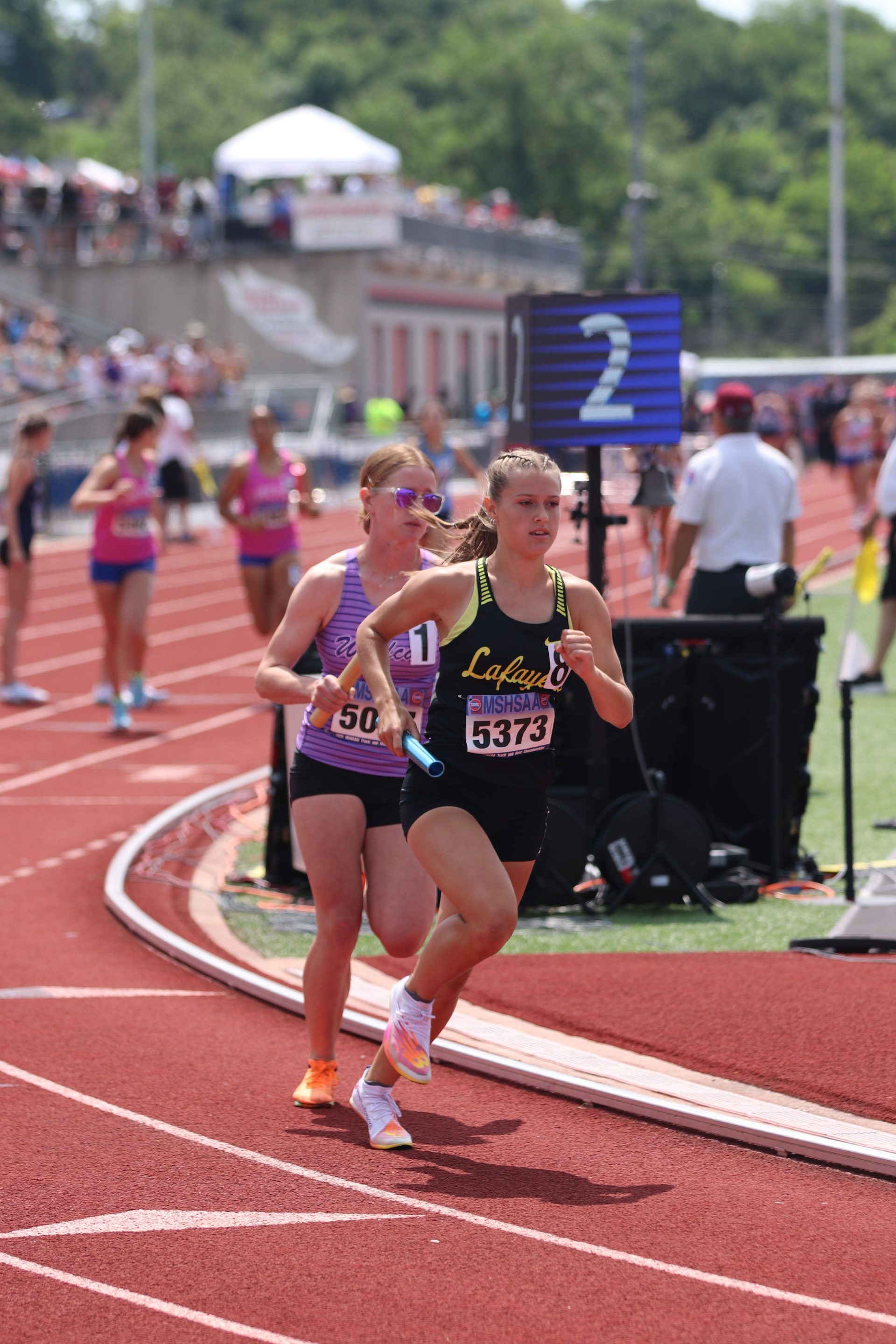 Kelly competing in State 4x800 relay